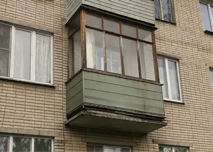 Утепленный балкон с окнами РЕХАУ